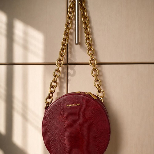 Mariaceline round shoulder bag in burgundy with gold chain like new
