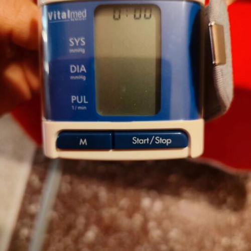 Wrist blood pressure monitor used with broken plastic case