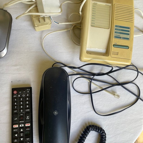Set of old cables, sockets and telephony devices used