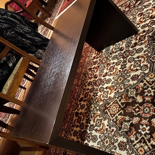 Coffee table used, rectangular wood with hidden wheels
