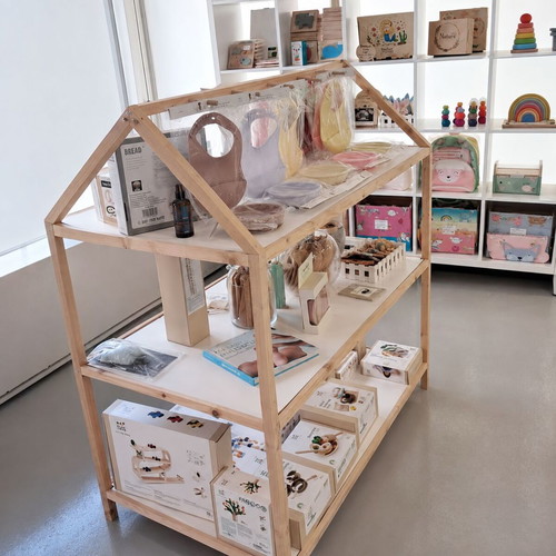 Wooden house-shaped display shelf for store