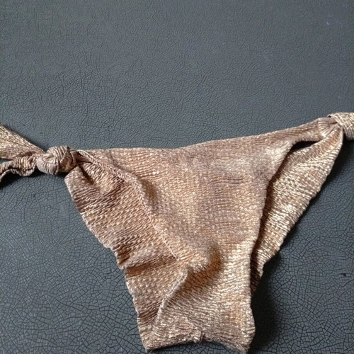 Bikini size M gold shiny like new