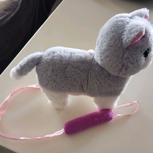 Plush cat like new with batteries and leash