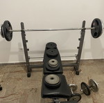 Weight bench and barbell set used with weights (3 x 20, 4 x 5, 5 x 2.5, 1 x 1.25kg)
