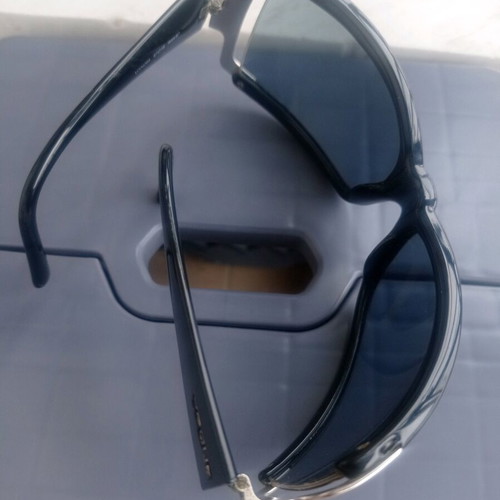 Vogue sunglasses used, black with scratch on lens
