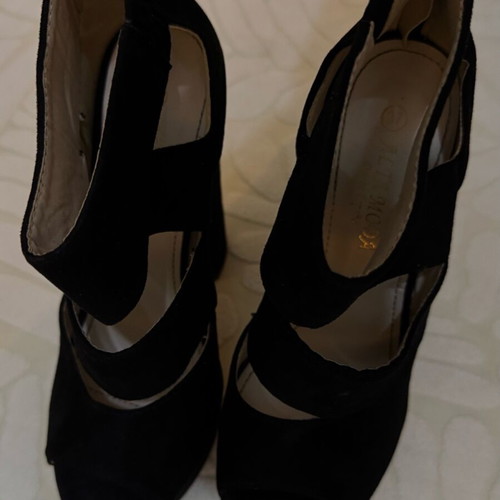 Black platforms size 36 mint condition with gold zipper