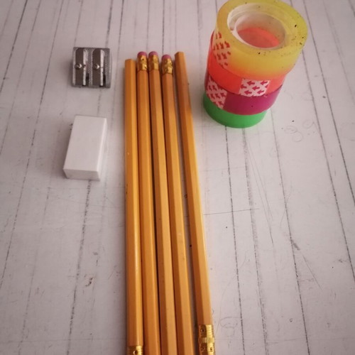 Stationery set new with colored tape, cutters, sharpeners, pencils and notebooks