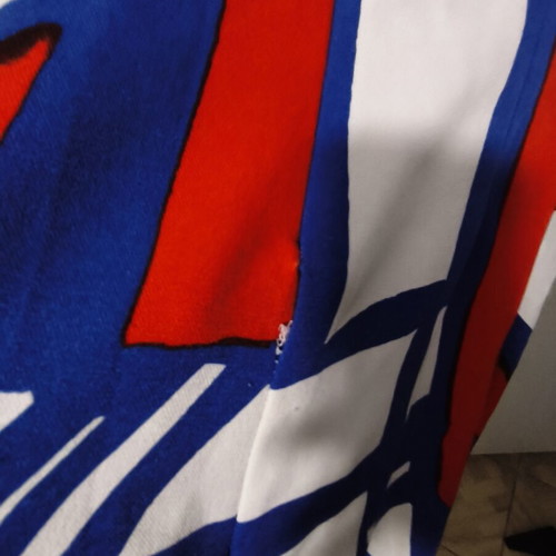 Short dress used with colorful pattern and inner zipper