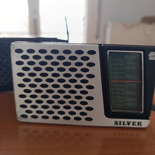 Silver transistor radio vintage portable used