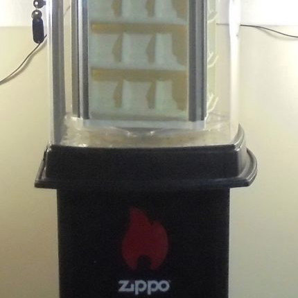 Zippo lighter display stand used, illuminated and rotating with storage base for 60 lighters