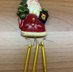 Santa Claus Christmas decoration set with bells and berries