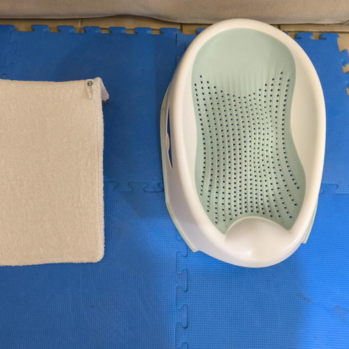 Baby bath seats like new, set of two with removable fabric and pillow
