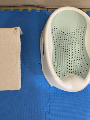 Baby bath seats like new, set of two with removable fabric and pillow