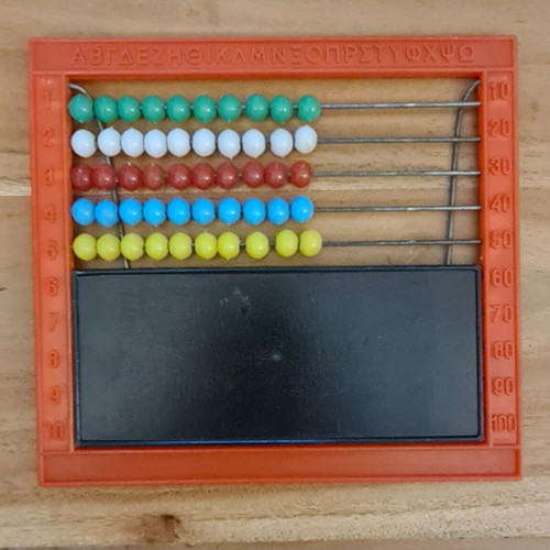Red plastic abacus up to 50 with alphabet and blackboard, like new, 1980s