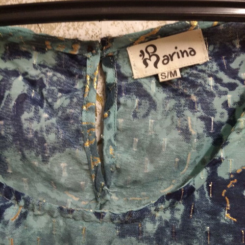 Women's cotton top with metallic gold shine and abstract animal print