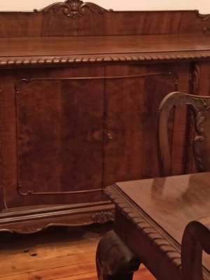 Antique English-style buffet with carved details