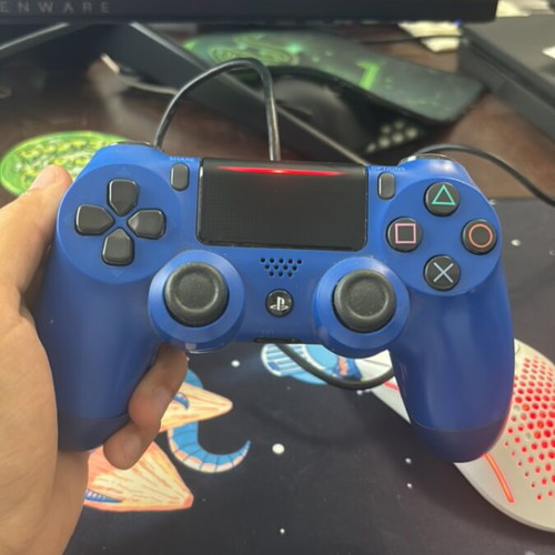 Sony PS4 Slim 1TB console with DualShock 4 controller