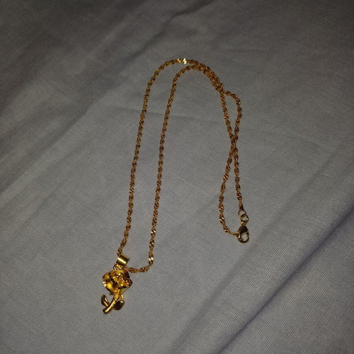 Gold color necklace with rose design, brand new