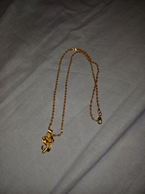 Gold color necklace with rose design, brand new