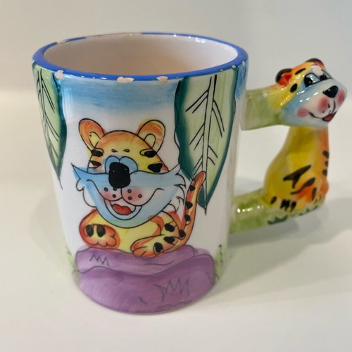 Tiger design mug used, small rim damages