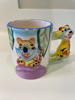 Tiger design mug used, small rim damages