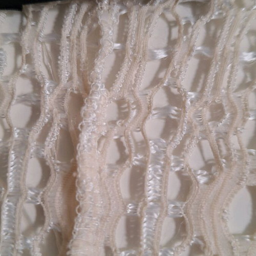 Dress ecru with lace used and inner slip