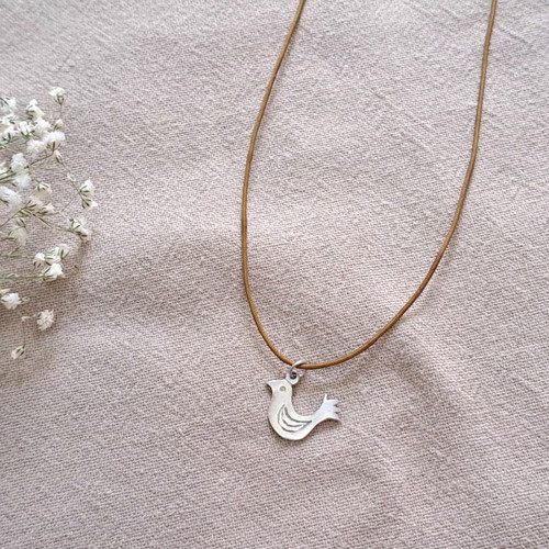 Vally Kontidis Silver Bird Necklace on Ecru Cord like new