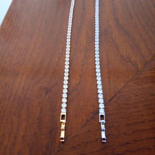 Riviera bracelet new, gold and silver with zircon stones, 18cm