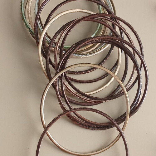 Silver and gold bracelets like new