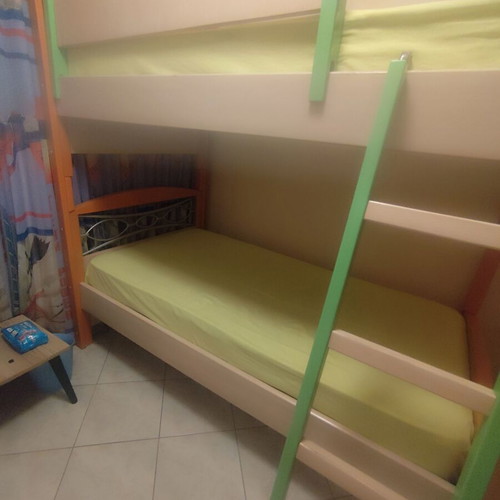 Bunk bed with anatomical mattresses and desk like new