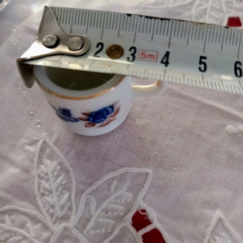 Vintage porcelain miniature set cup and saucer I Love You with gold trim like new