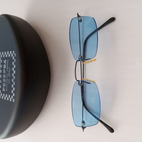 Vintage Y2K Sunglasses with Blue Lenses and Collectible PezeRva Case like new