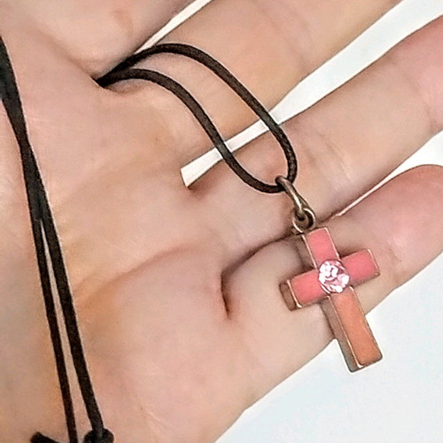 Pink cross used with crystal and adjustable cord