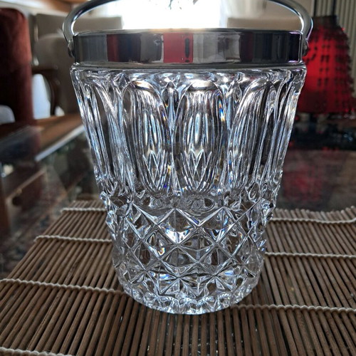 Vintage crystal ice bucket used with stainless steel rim and handle