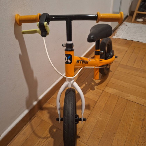 Balance bike for children, orange, adjustable height
