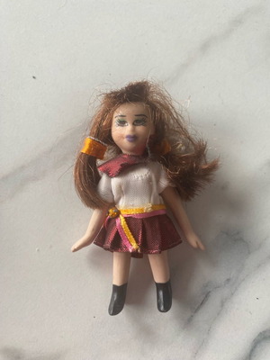 Vintage small doll used in good condition
