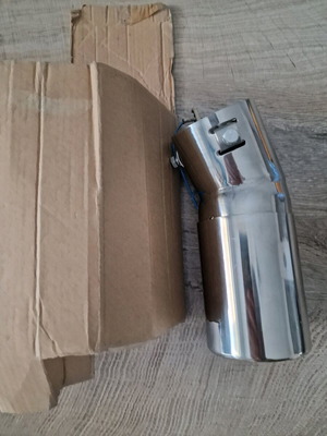 Illuminated car exhaust tip like new with small crack