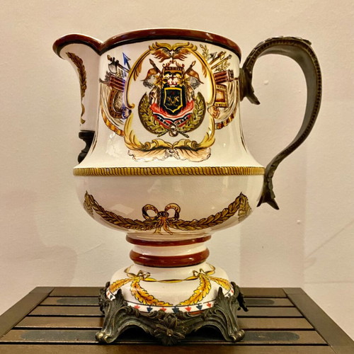 Decorative ceramic pitcher with brass fittings like new