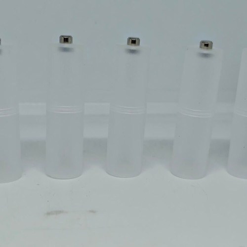 Battery adapters AA to C set of 8, like new, plastic transparent