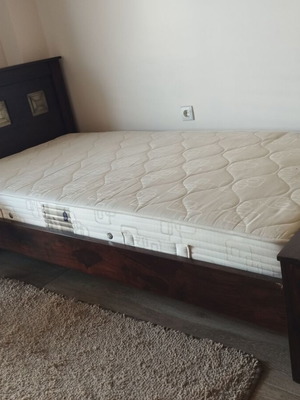 Rustic single wooden bed with mattress like new, dark wood