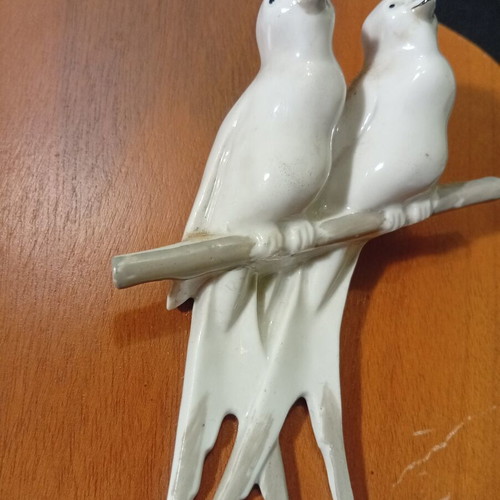 Wall panels used with wooden base and porcelain swallows and storks