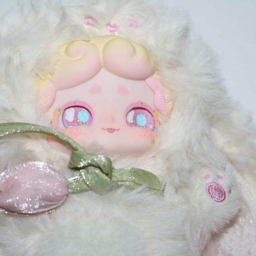 Plush doll baby miniature with flower