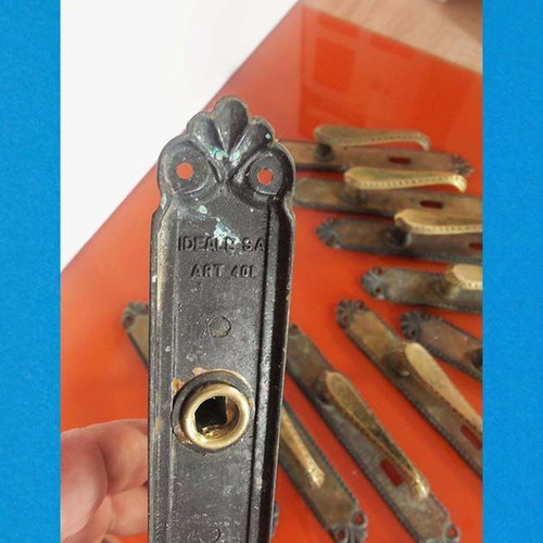 Metal door handles with antique decorative elements, set of 10 used