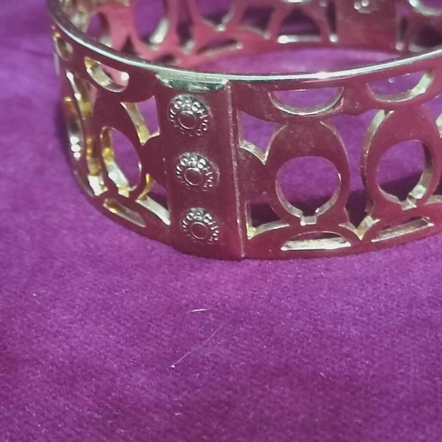 Coach bracelet like new, metal in gold color