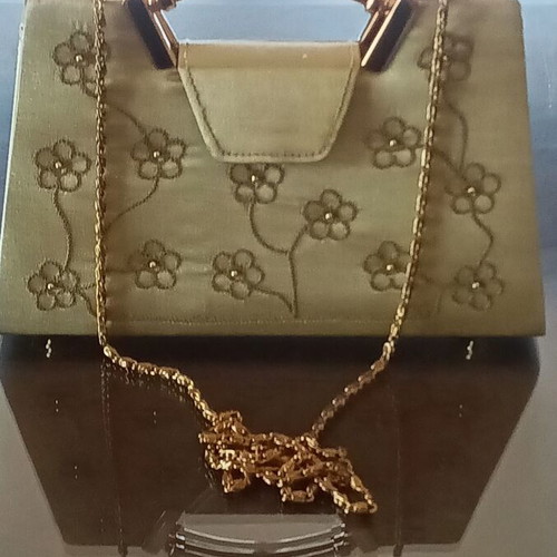 Small gold handbag with handle and long chain, like new