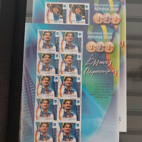 Leuchtturm stamp album with unused 2004 Olympic Games stamps used