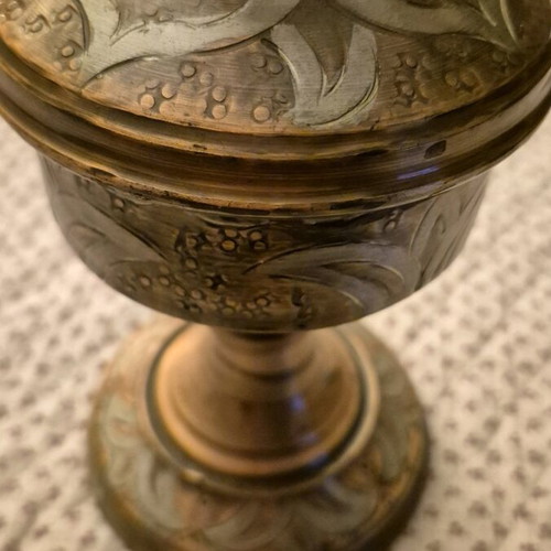 Brass antique oil lamp used with decorative engravings
