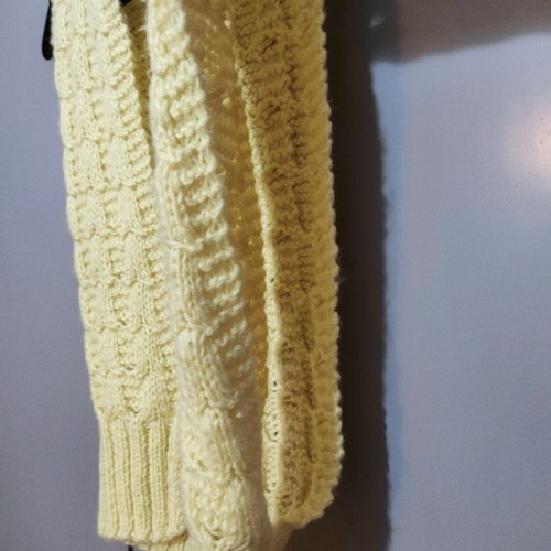 Sleeveless knitted vest used with pattern yellow pale
