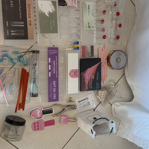 Nail products set like new with dual forms, tips, and accessories