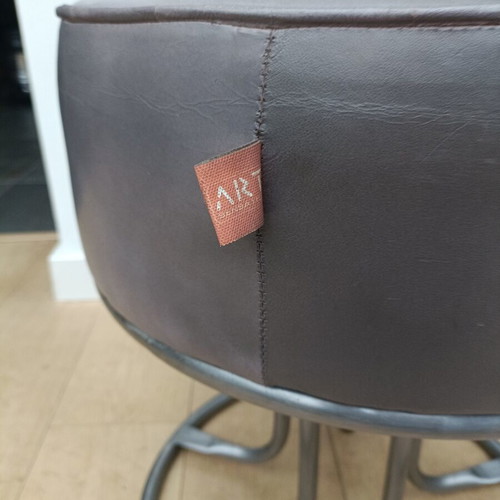 Art Sensation grey leather pouf with metal base